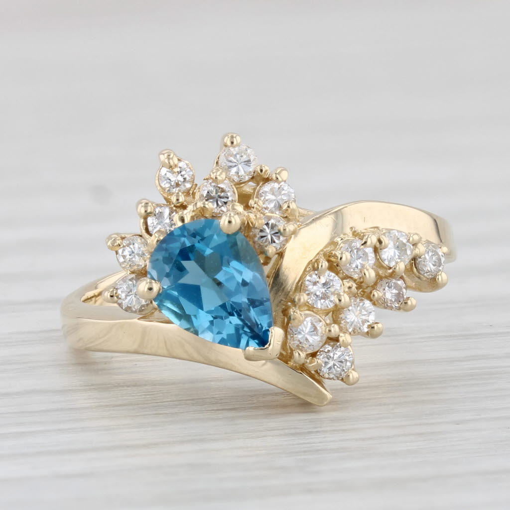Light Gray 1.15ctw Pear Blue Topaz Diamond Ring 14k Yellow Gold Size 5.25