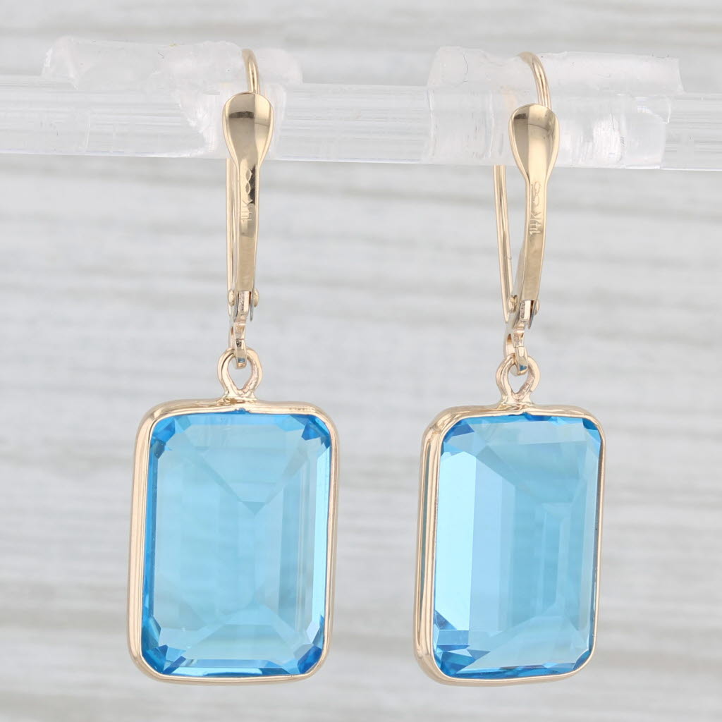 Light Gray 25ctw Blue Topaz Dangle Earrings 14k Yellow Gold Emerald Cut Drops