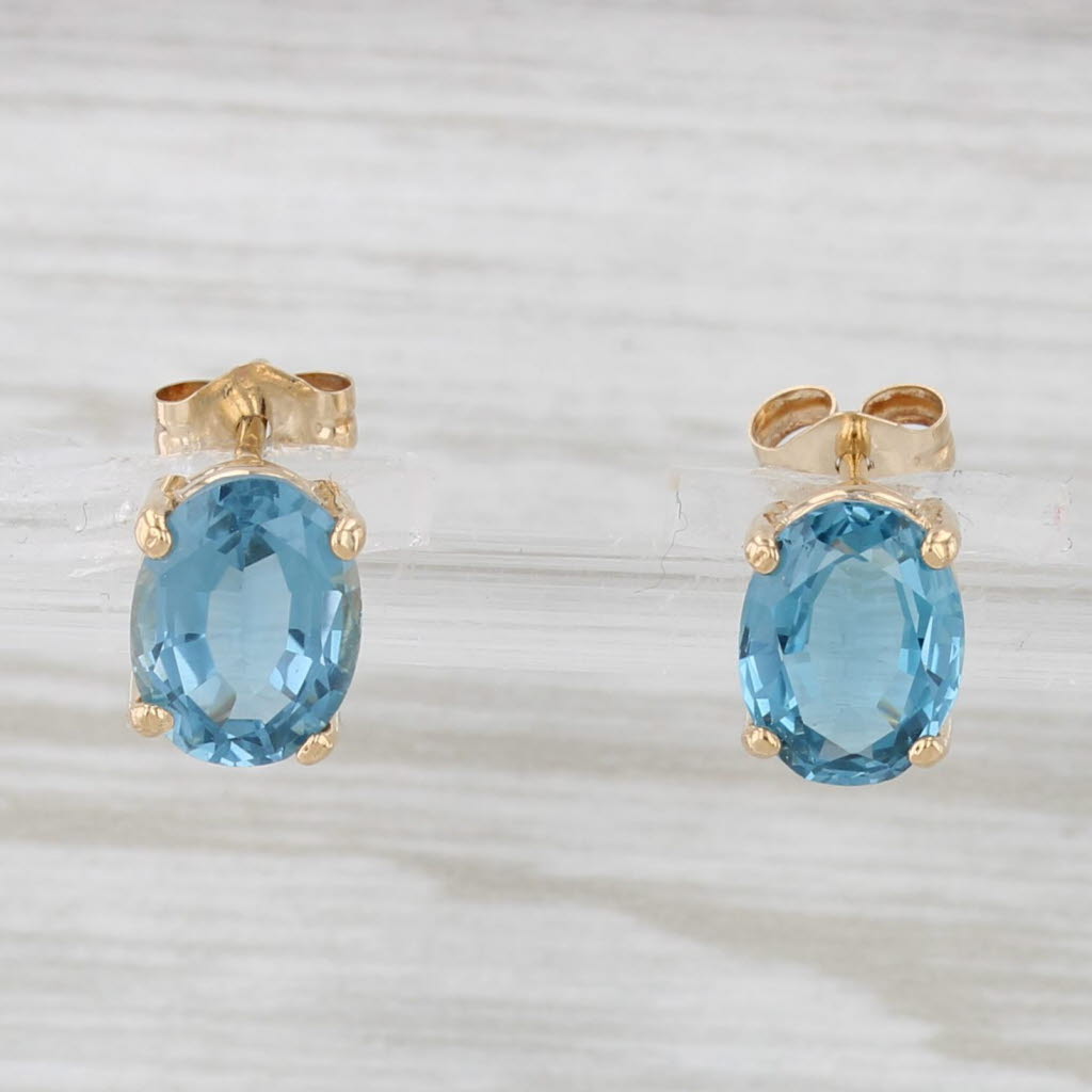 Light Gray 3.20ctw Oval Blue Topaz Solitaire Stud Earrings 14k Yellow Gold