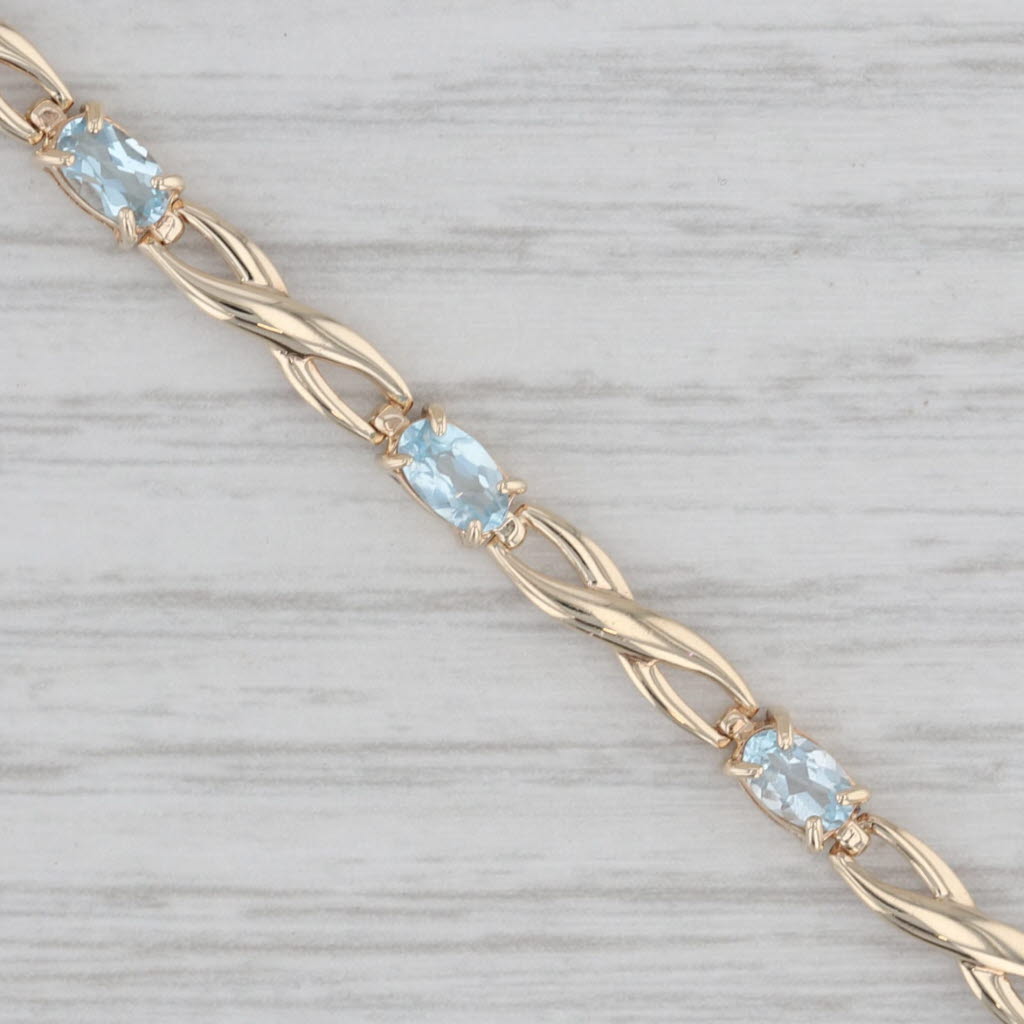 Gray 2.60ctw Blue Topaz Tennis Bracelet 10k Yellow Gold 7" 3.5mm