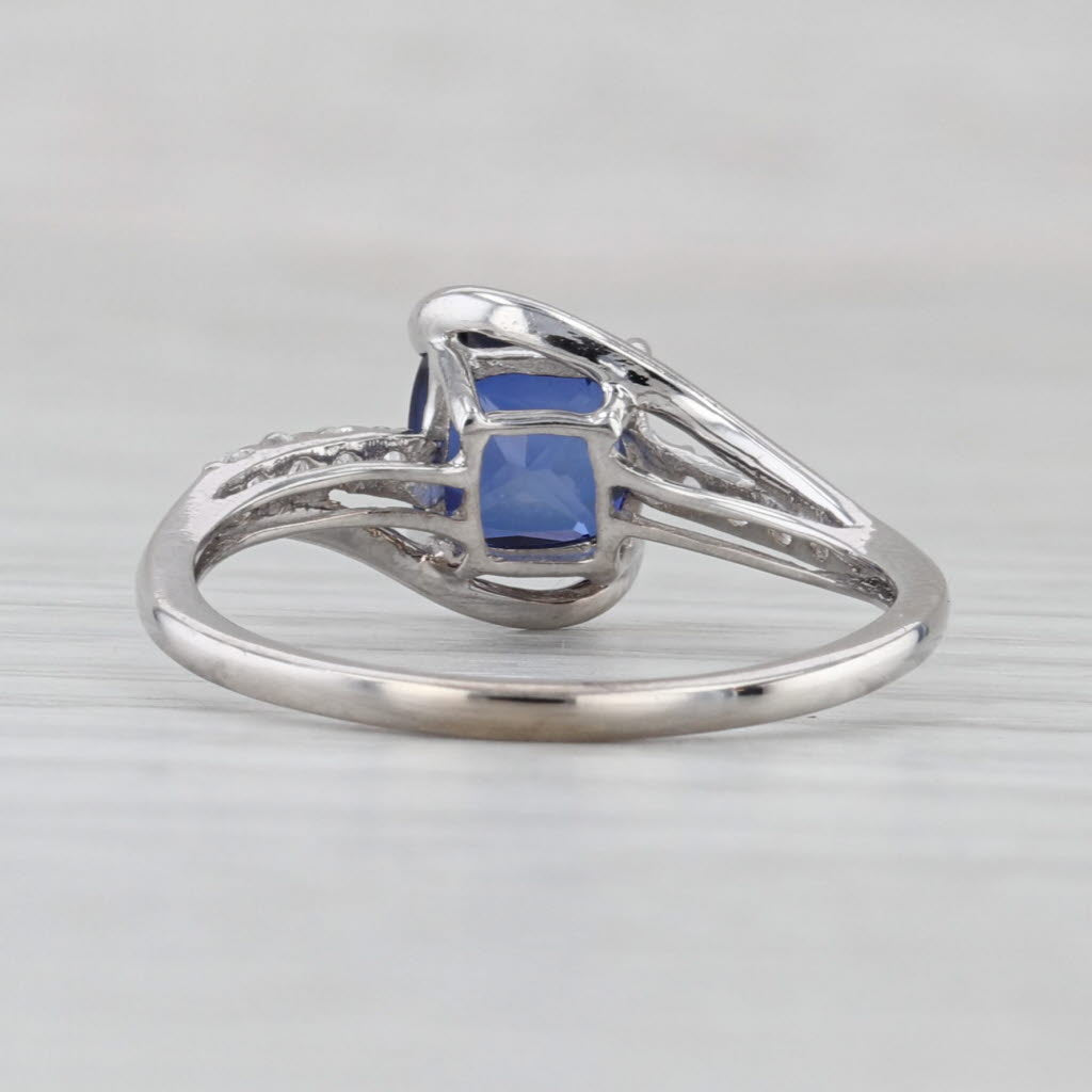1.41ctw Lab Created Blue Sapphire White Topaz Ring 10k White Gold Size 7 Bypass
