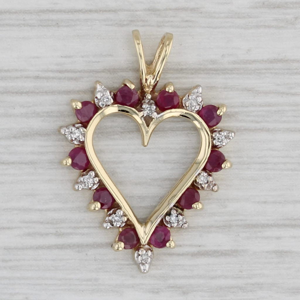 Gray 0.43ctw Ruby Diamond Open Heart Pendant 10k Yellow Gold