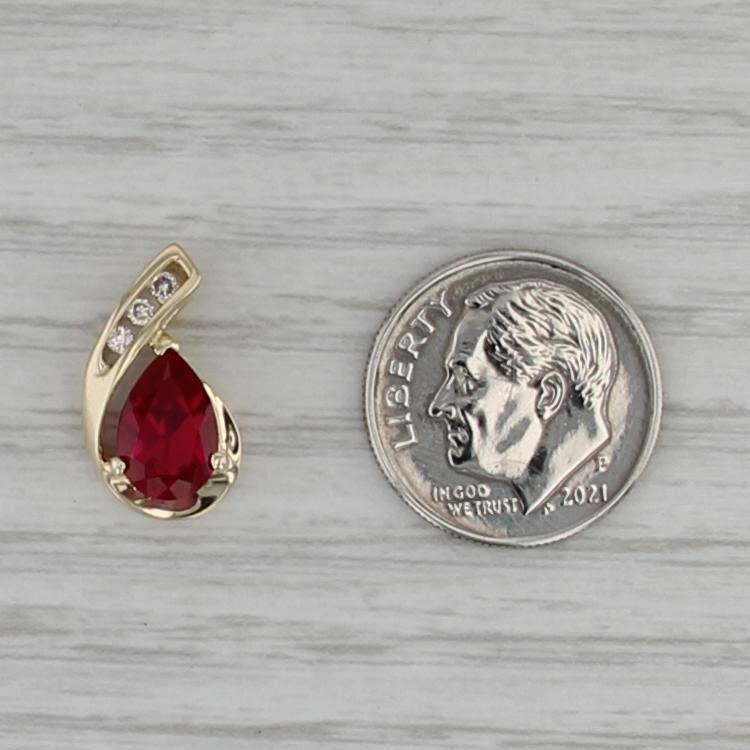 1.74ctw Pear Lab Created Ruby Diamond Teadrop Pendant 10k Yellow Gold