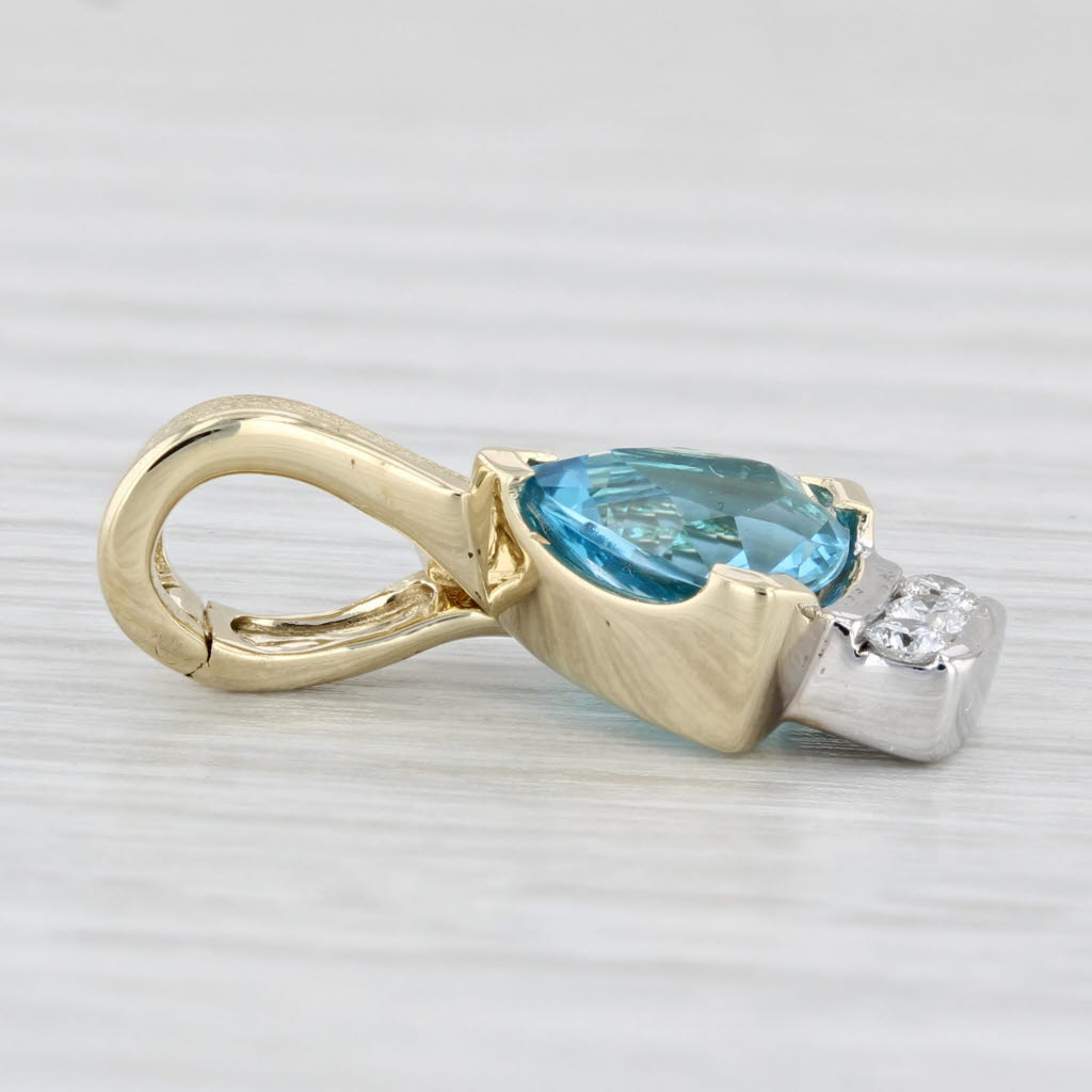 Light Gray 2.29ctw Trillion Blue Topaz Diamond Pendant 14k Yellow Gold