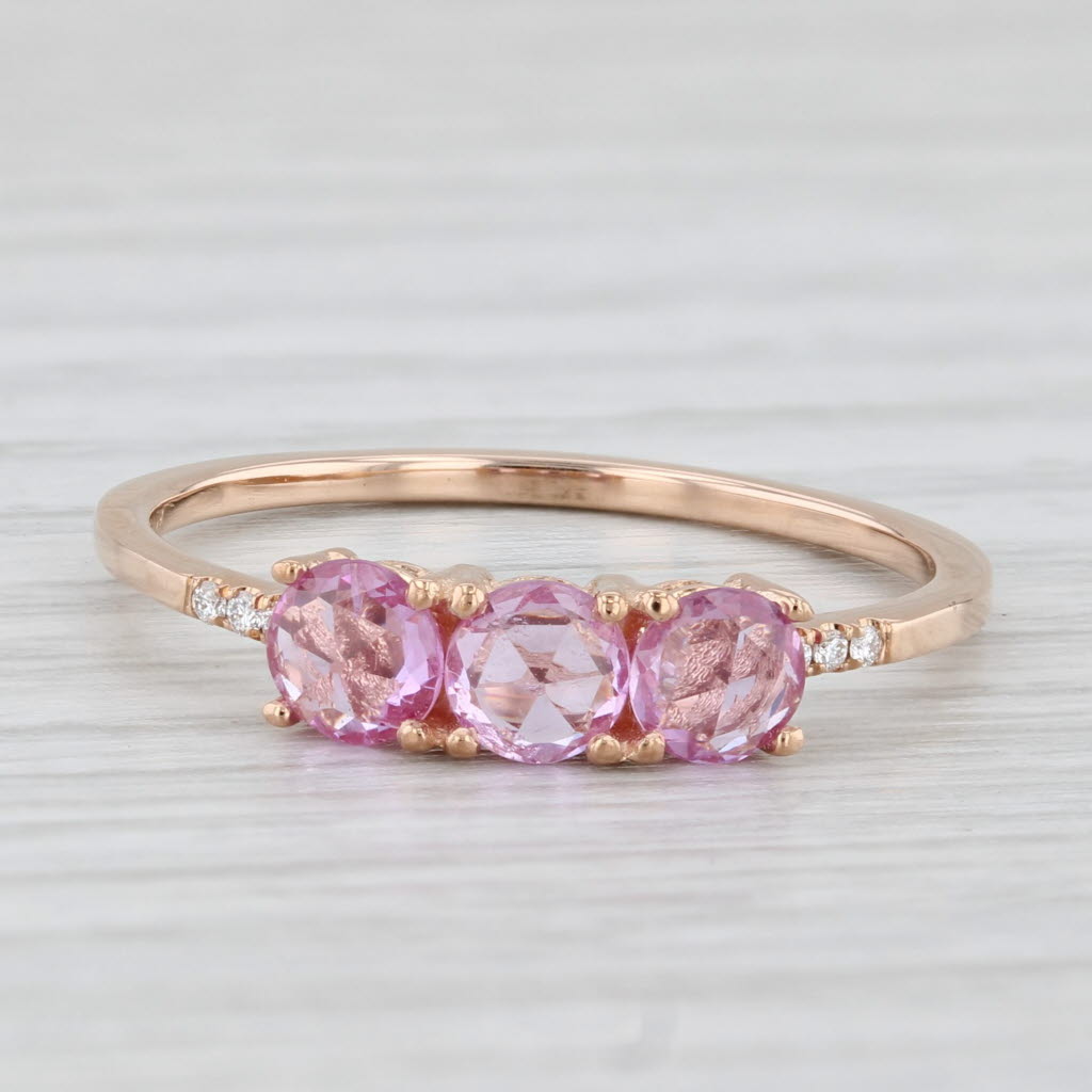Light Gray 0.96ctw Pink Sapphire 3-Stone Ring 14k Rose Gold Diamond Accents Size 8.5