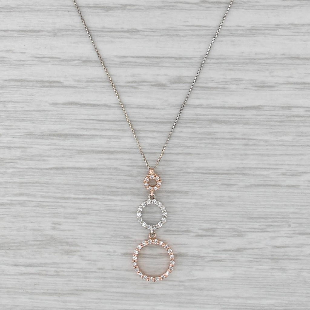 0.11ctw Diamond Graduated 3-Ring Pendant Necklace 14k Tri-tone Gold 22.75"