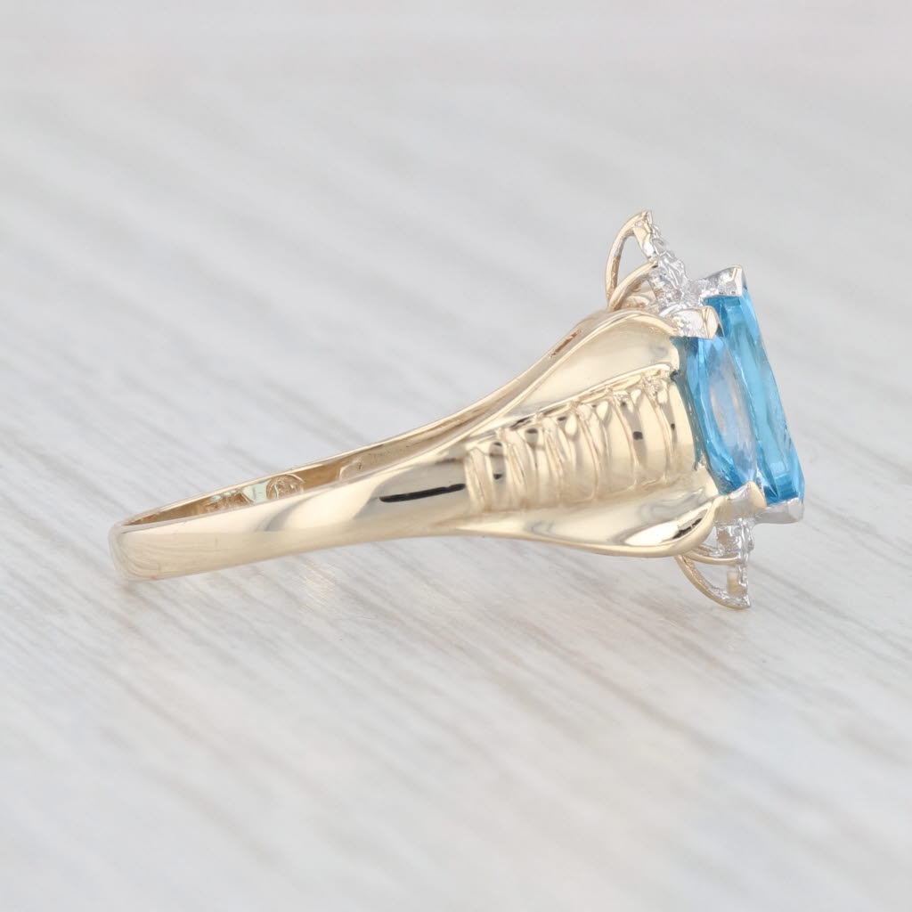 Light Gray 1.25ctw 3-Stone Blue Topaz Diamond Ring 10k Yellow Gold Size 7.25