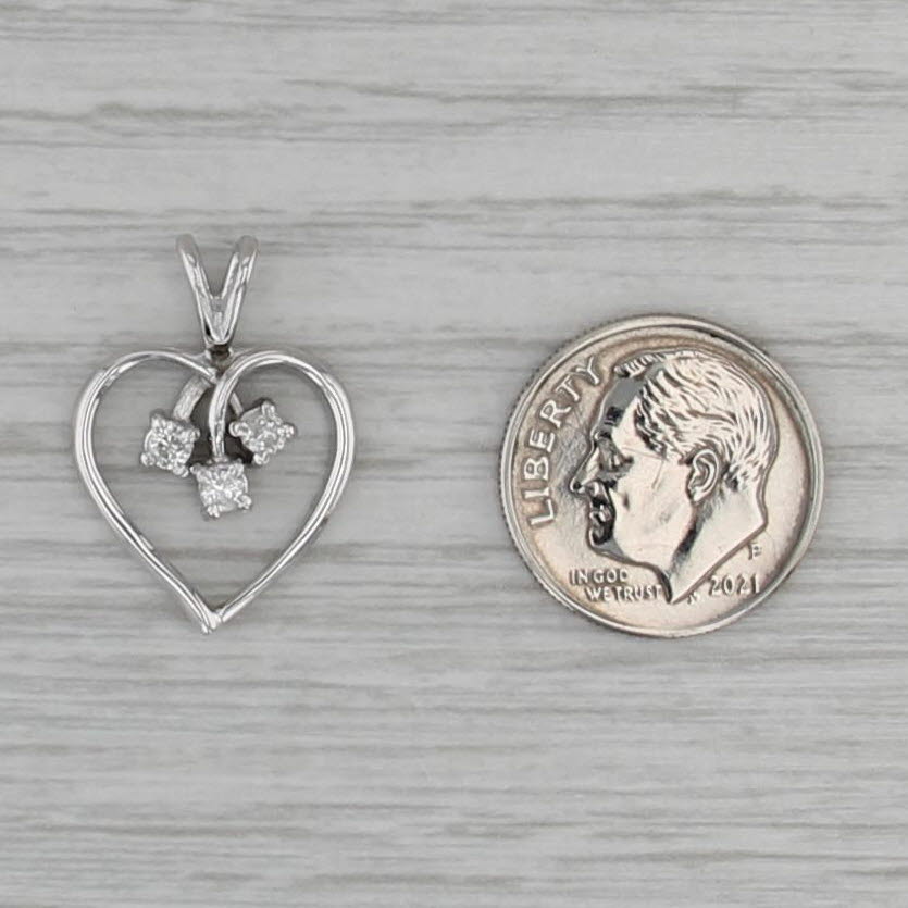 0.12ctw Diamond 3-Stone Open Heart Pendant 14k White Gold