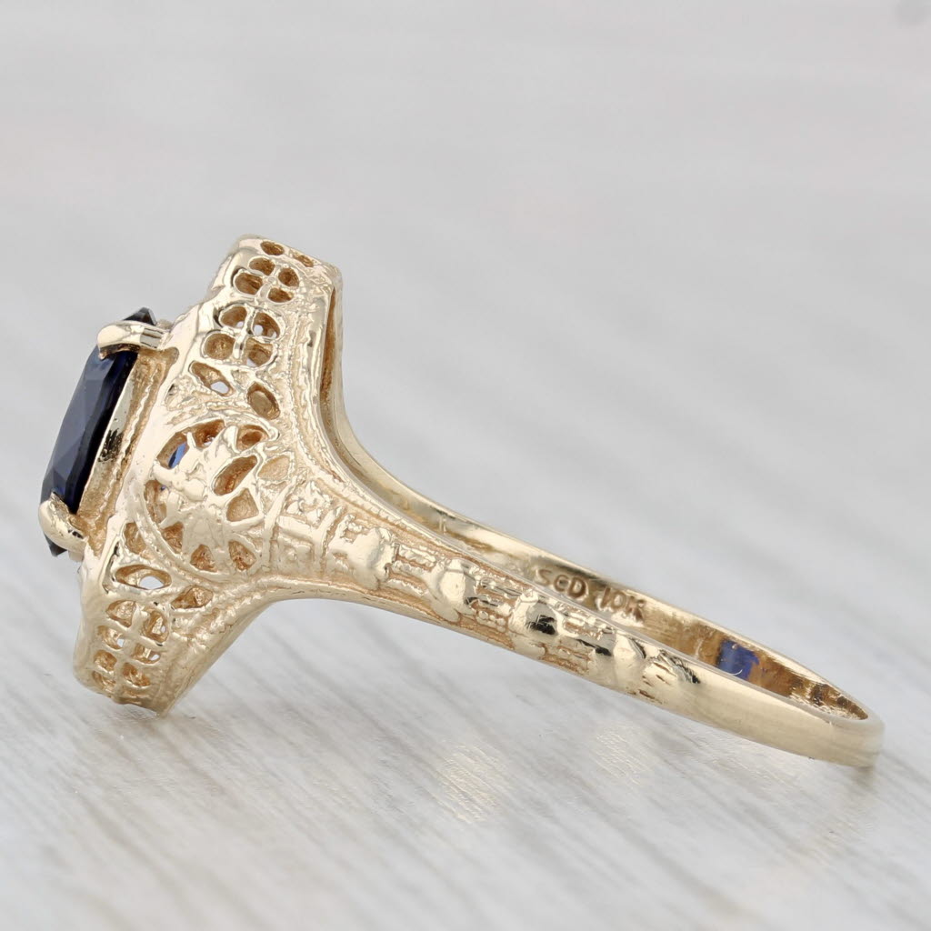 Light Gray 0.72ct Oval Lab Created Blue Sapphire 10k Yellow Gold Floral Filigree Size 9.5