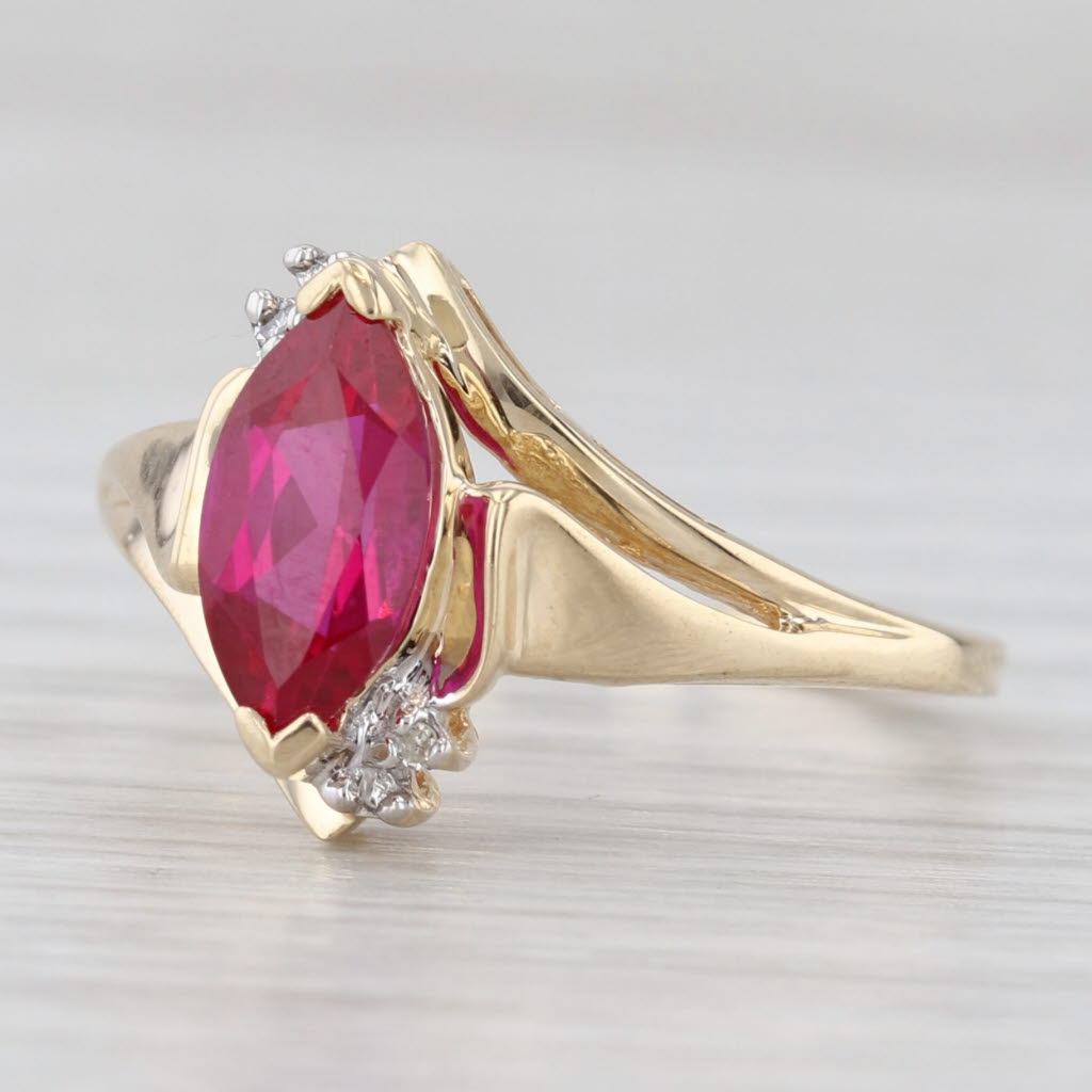 Light Gray 1.48ct Lab Created Ruby Ring 10k Yellow Gold Size 8.25 Bypass