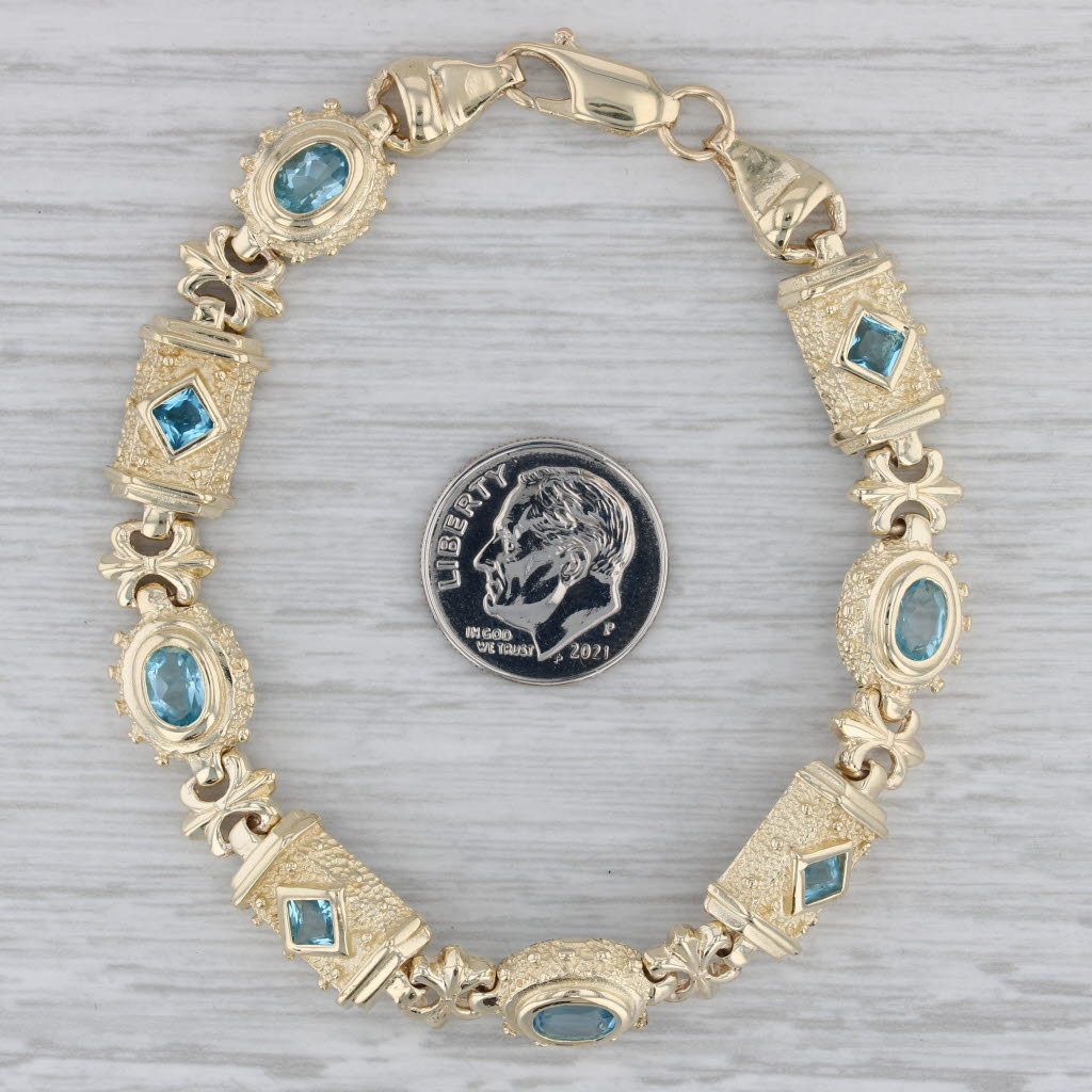 Gray 3ctw Blue Topaz Ornate Bracelet 14k Yellow Gold 7.25" 10.4mm