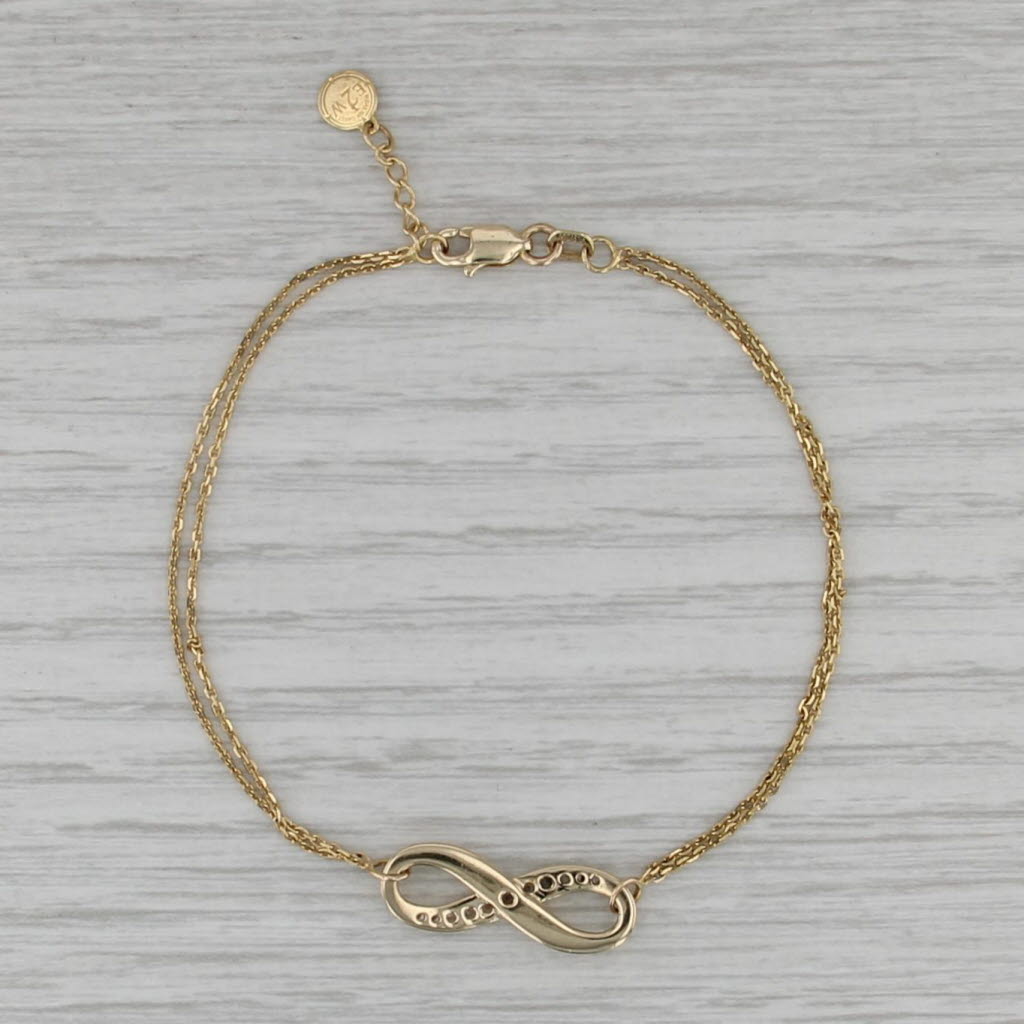 Cubic Zirconia Infinity Knot Bracelet 10k Yellow Gold 7-7.5" Cable Chain