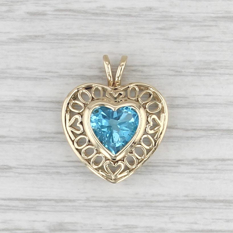 3.35ct Blue Topaz Heart Pendant 14k Yellow Gold Heart Accents
