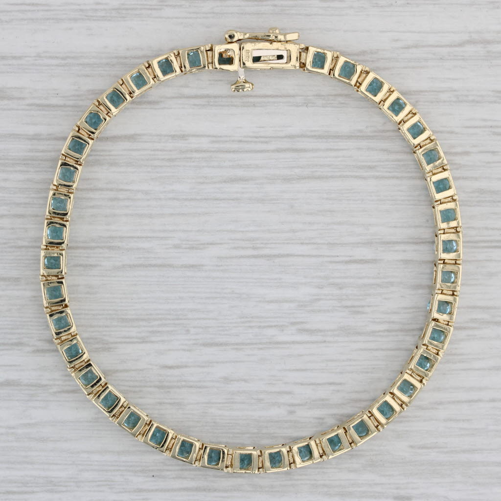 Gray 5.70ctw Blue Topaz Tennis Bracelet 14k Yellow Gold 7" 3.6mm