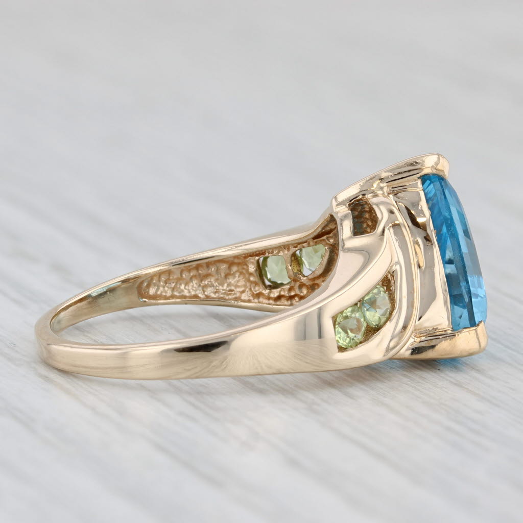 Light Gray 7.54ctw Trillion Blue Topaz Green Peridot Ring 10k Yellow Gold Size 9