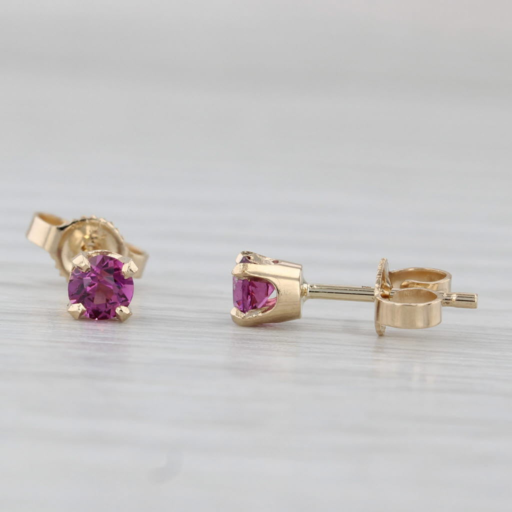 Light Gray 0.46ctw Garnet Round Solitaire Earrings 14k Yellow Gold