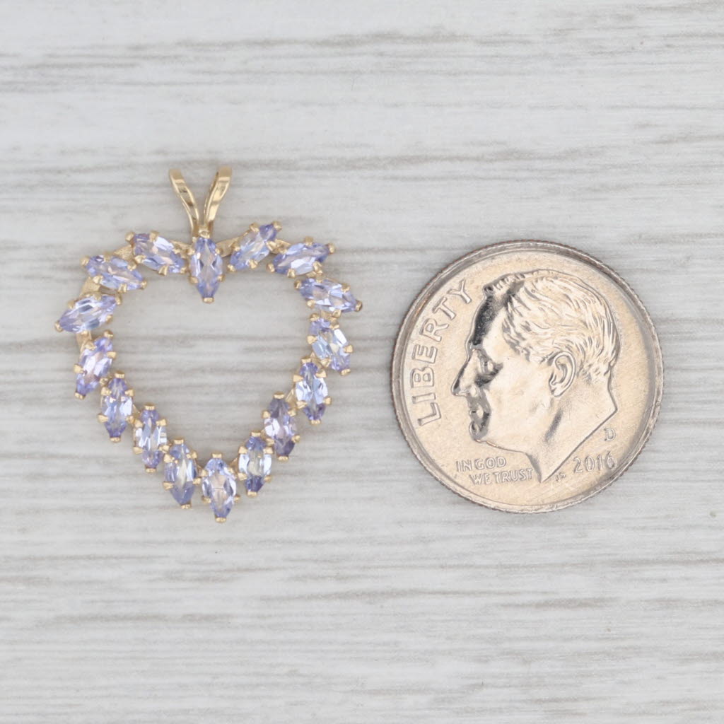1.25ctw Tanzanite Open Heart Pendant 14k Yellow Gold