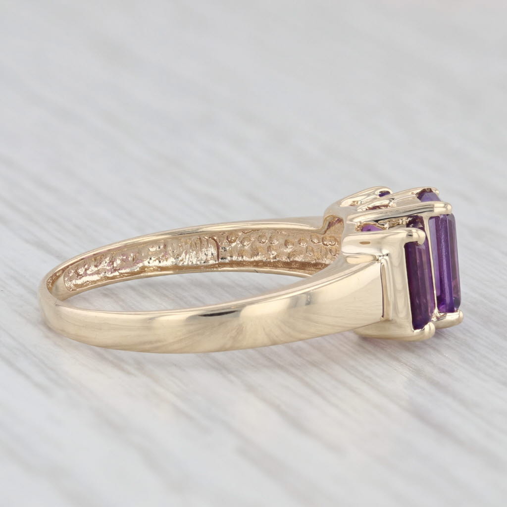 Light Gray 1.88ctw 3-Stone Emerald Cut Amethyst Ring 10k Yellow Gold Size 7.5
