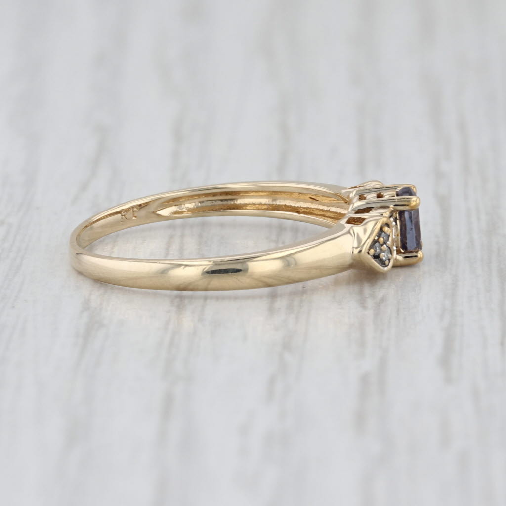 0.45ctw Color Change Garnet Diamond Ring 10k Yellow Gold Heart Accents