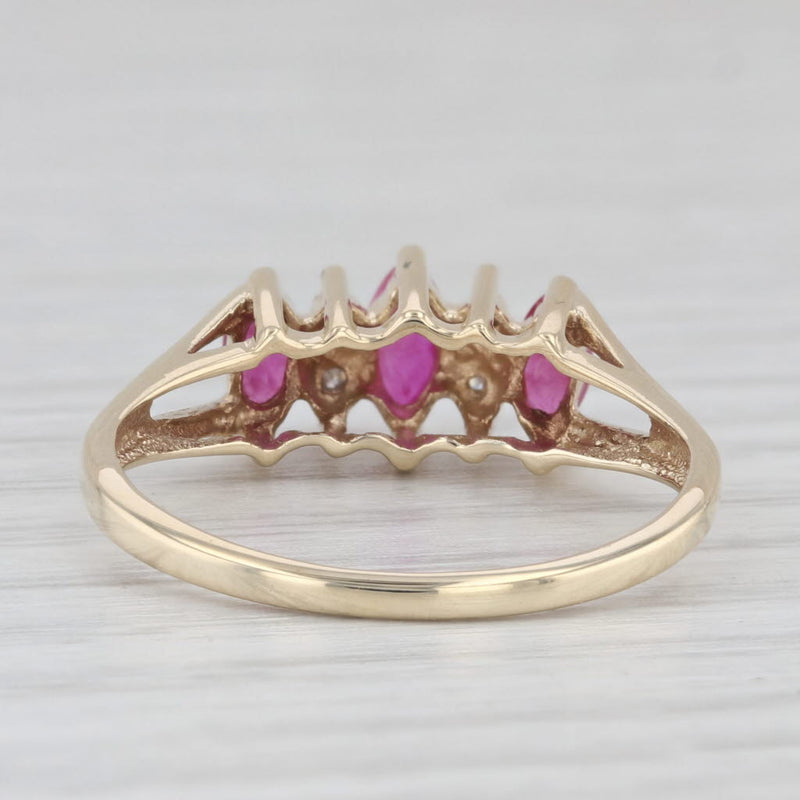 0.77ctw Marquise Ruby 3-Stone Diamond Ring 10k Yellow Gold Cathedral Size 8