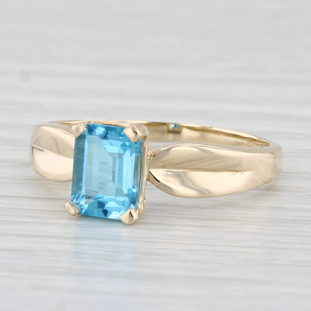 Light Gray 1.70ct Blue Topaz Solitaire Ring 10k Yellow Gold Size 10.25 Emerald Cut