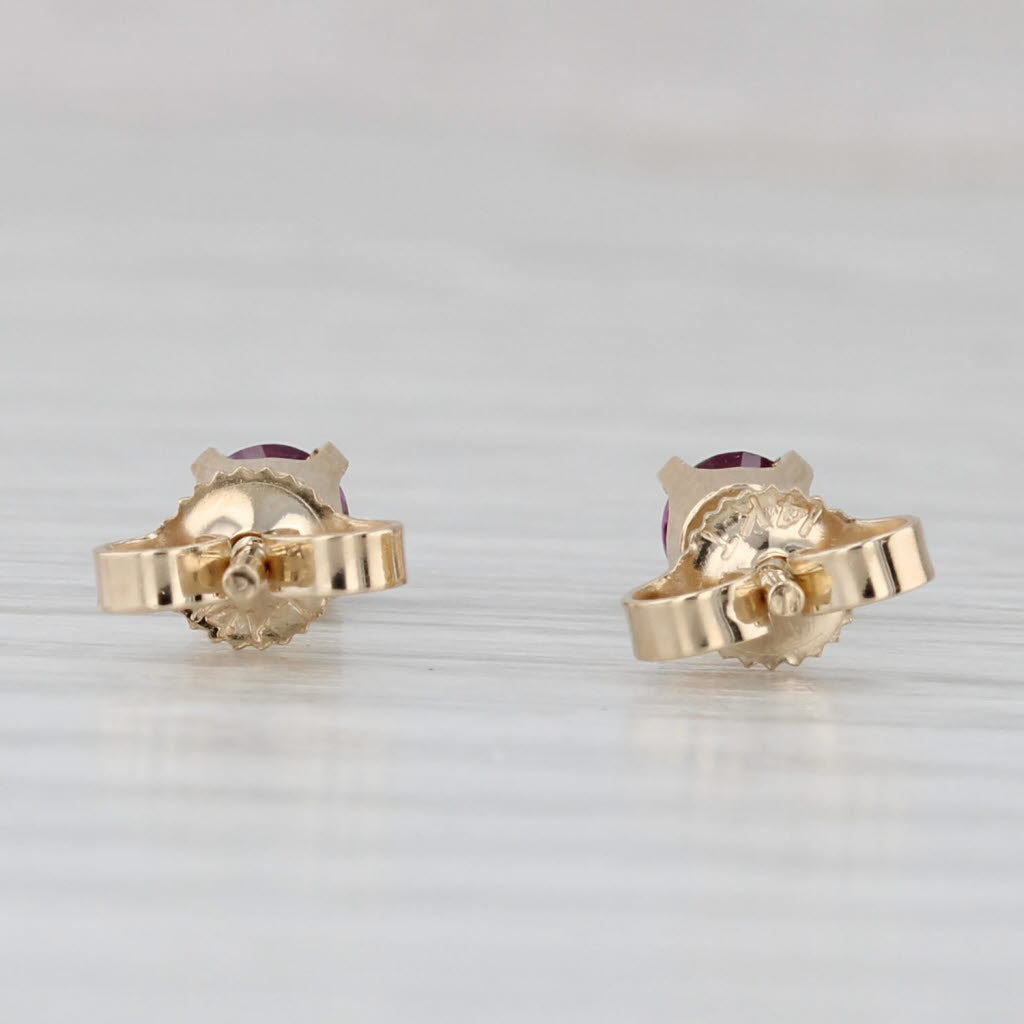 Light Gray 0.46ctw Garnet Round Solitaire Earrings 14k Yellow Gold