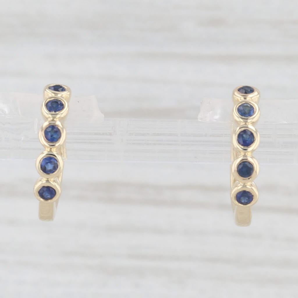 Light Gray New Blue 0.10ctw Sapphire Hoop Huggie Earrings 10k Yellow Gold Round Hoops