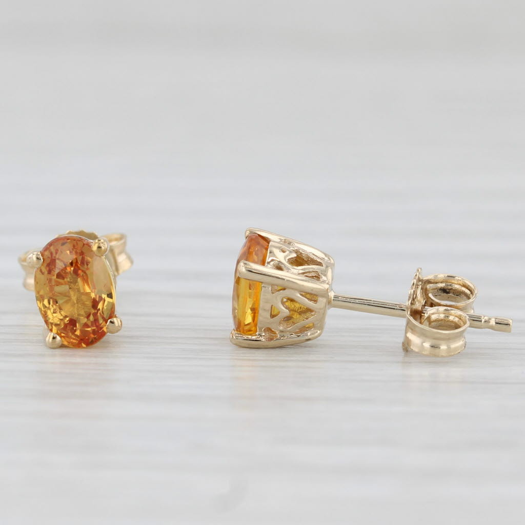 Light Gray 1.20ctw Oval Orange Citrine Solitaire Stud Earrings 10k Yellow Gold