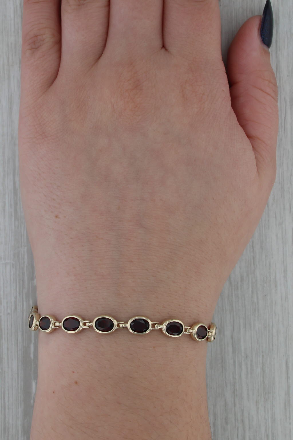 13ctw Garnet Tennis Bracelet 10k Yellow Gold 7" 6.3mm Oval Links
