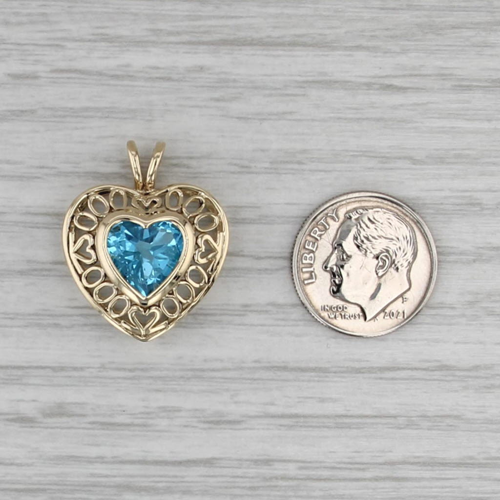3.35ct Blue Topaz Heart Pendant 14k Yellow Gold Heart Accents