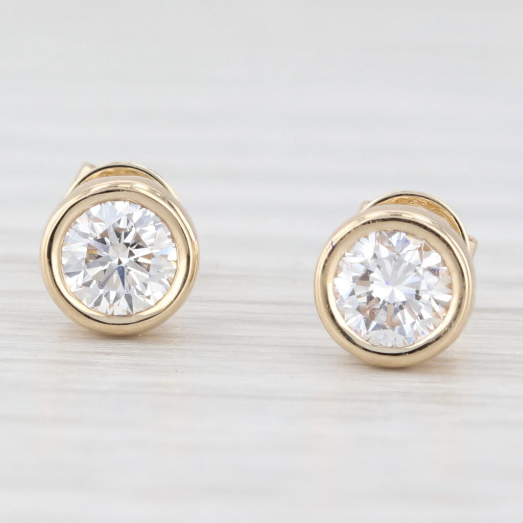 Light Gray New 0.56ctw Lab Grown Diamond Stud Earrings 14k Yellow Gold Round Solitaires