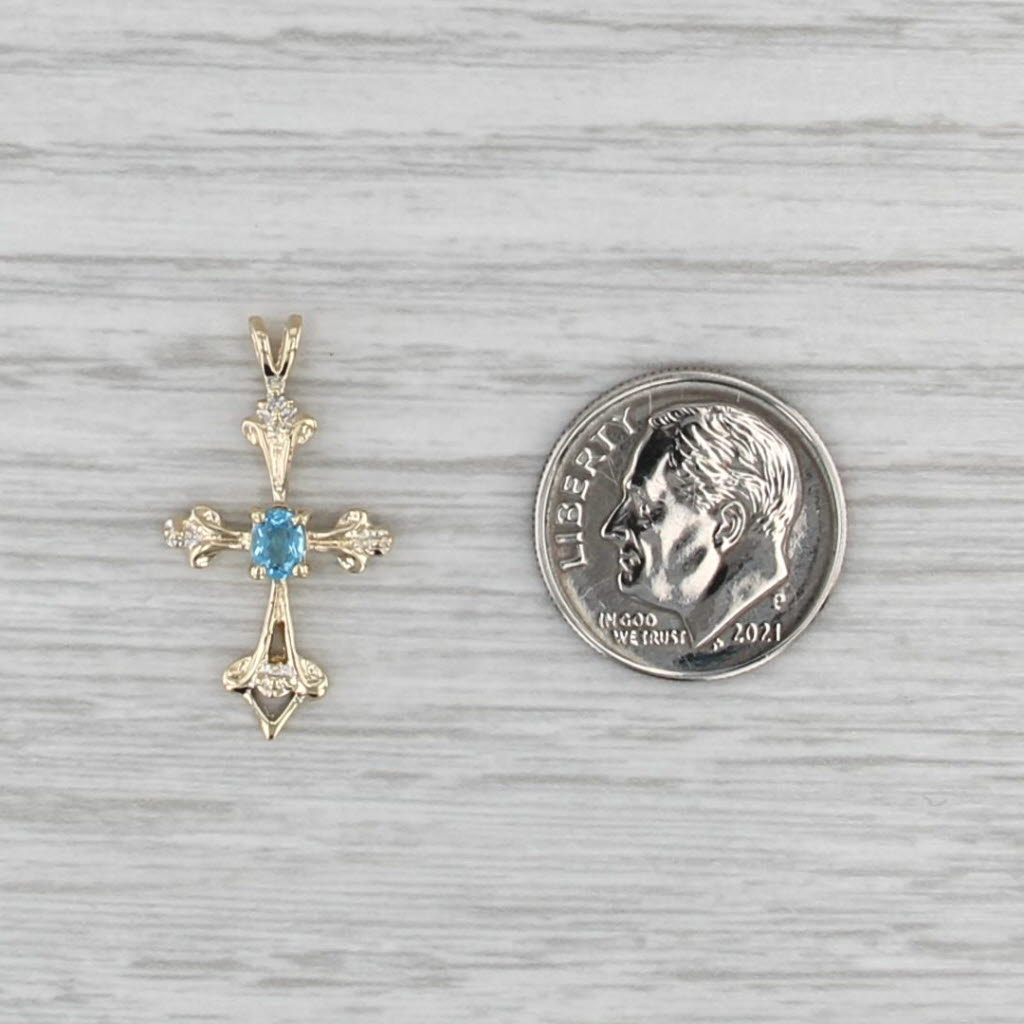 0.16ct Blue Topaz Cross Pendant 14k Yellow Gold Diamond Accents