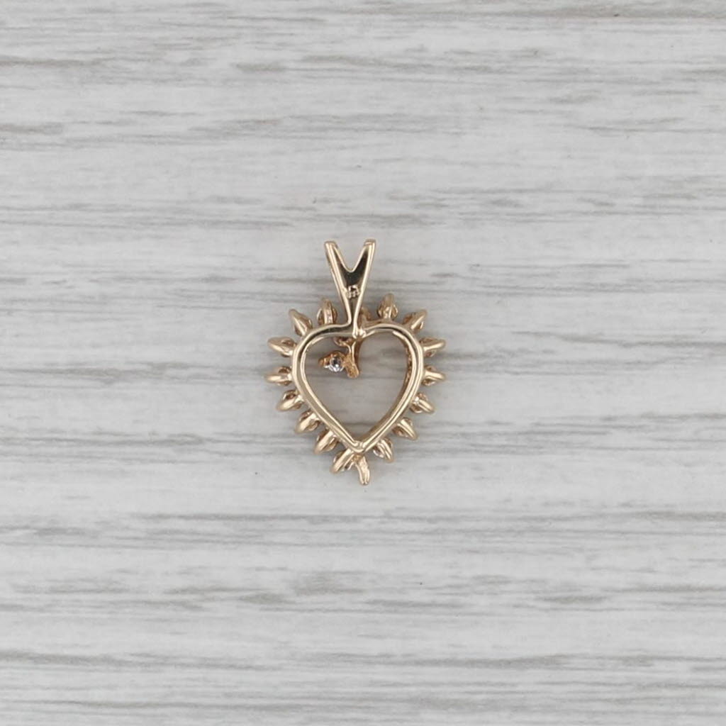 0.14ctw Diamond Framed Open Heart Pendant 10k Yellow Gold