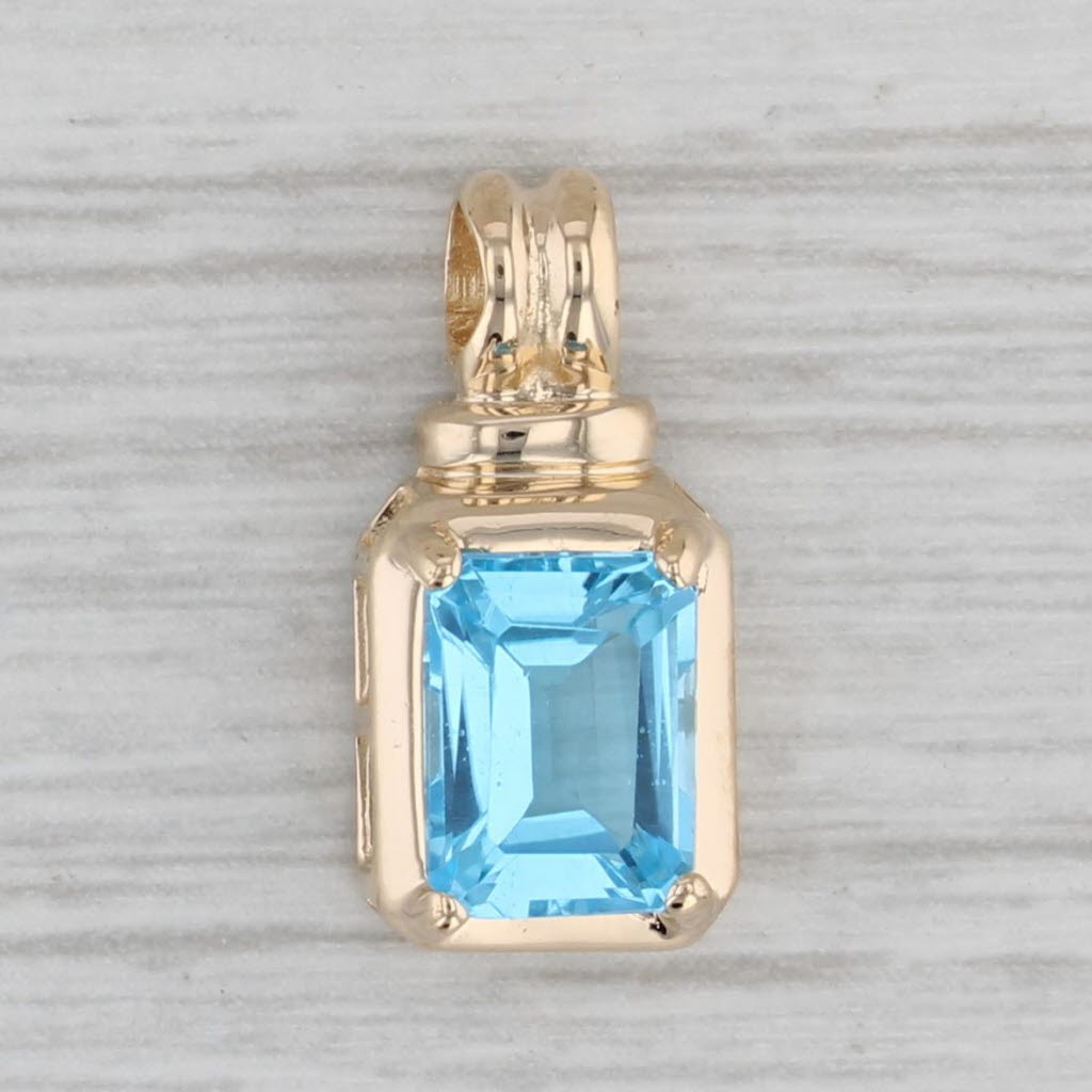Gray 2.06ct Blue Topaz Solitaire Pendant 14k Yellow Gold Small Emerald Cut Drop