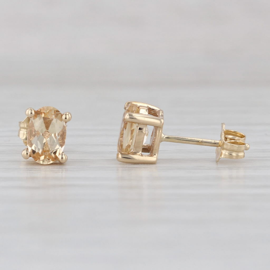 1.07ctw Yellow Topaz Stud Earrings 10k Yellow Gold Oval Solitaire Studs