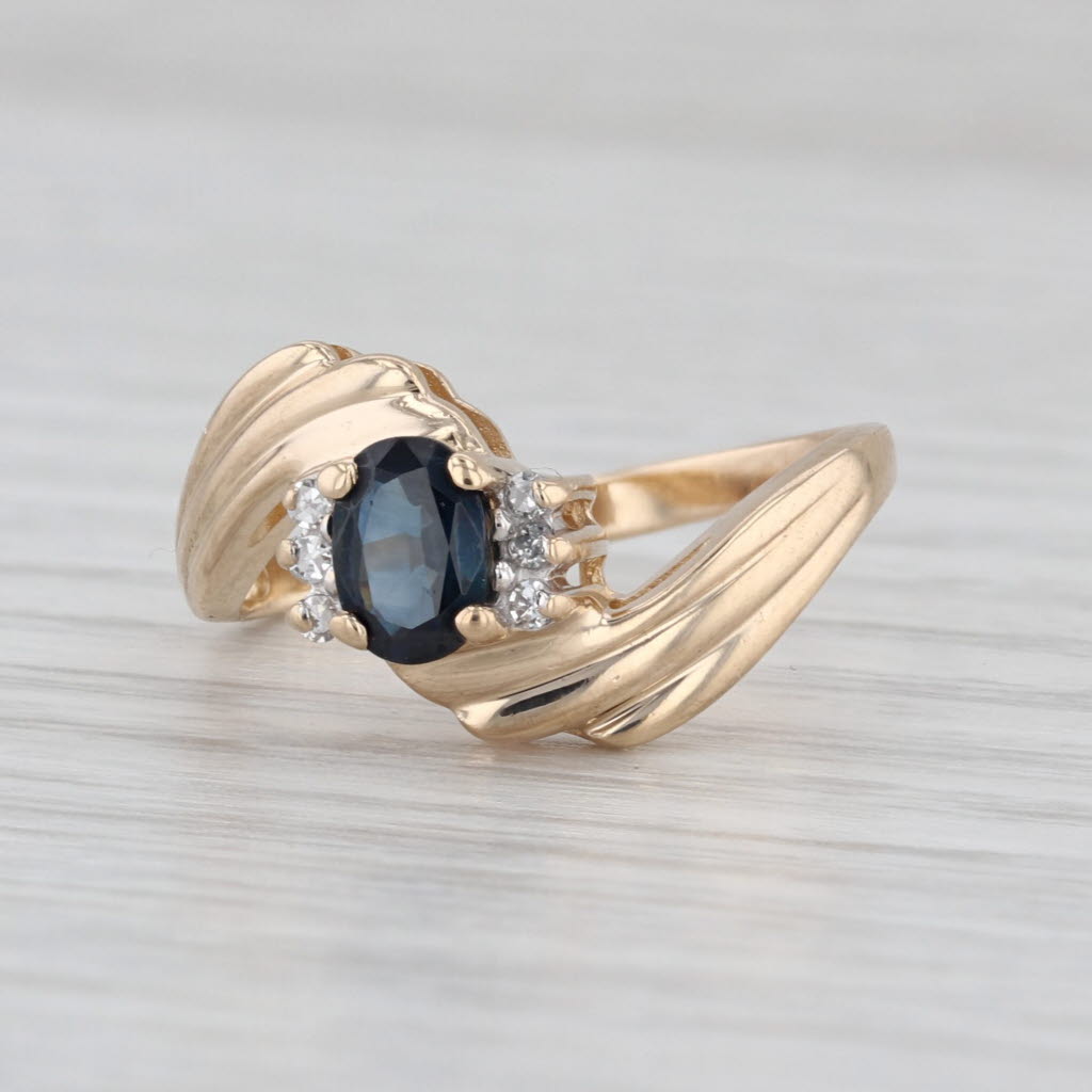 0.64ctw Oval Blue Sapphire Diamond Bypass Ring 14k Yellow Gold Size 6.5