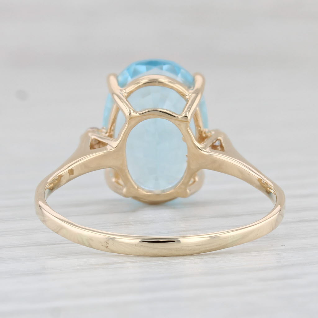 Light Gray 7.04ctw Oval Blue Topaz Diamond Ring 14k Yellow Gold Size 11.25