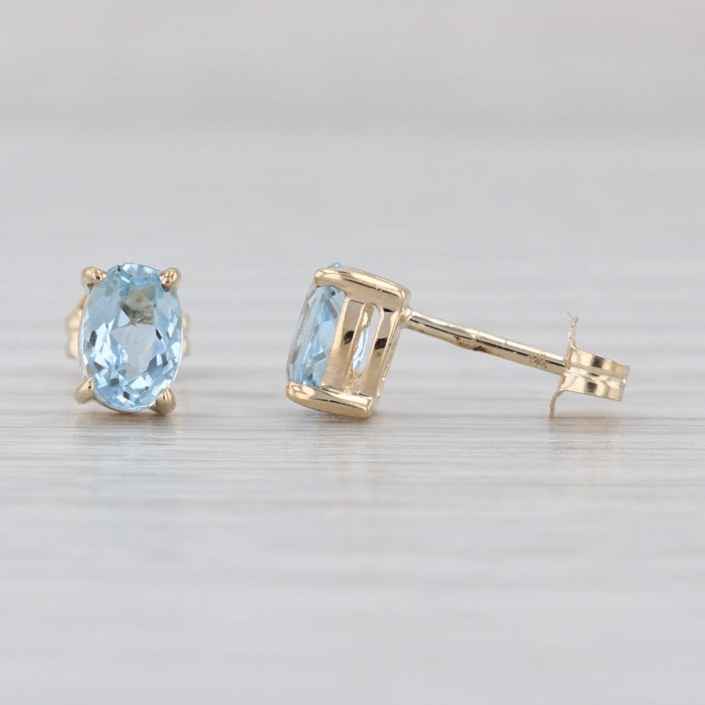 0.80ctw Oval Aquamrine Solitaire Stud Earrings 14k Yellow Gold Studs