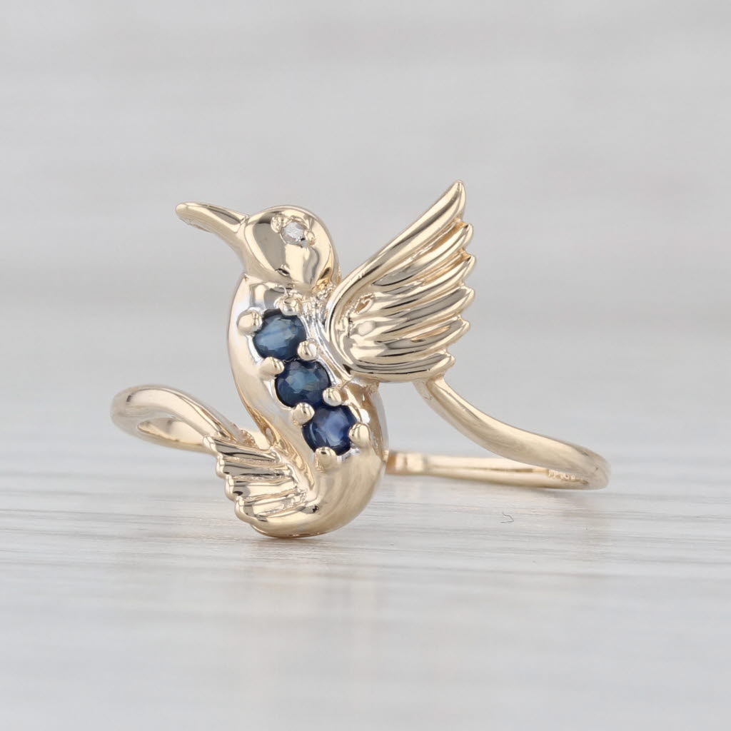 0.15ctw Blue Sapphire Hummingbird Ring 10k Yellow Gold Size 8 Bypass