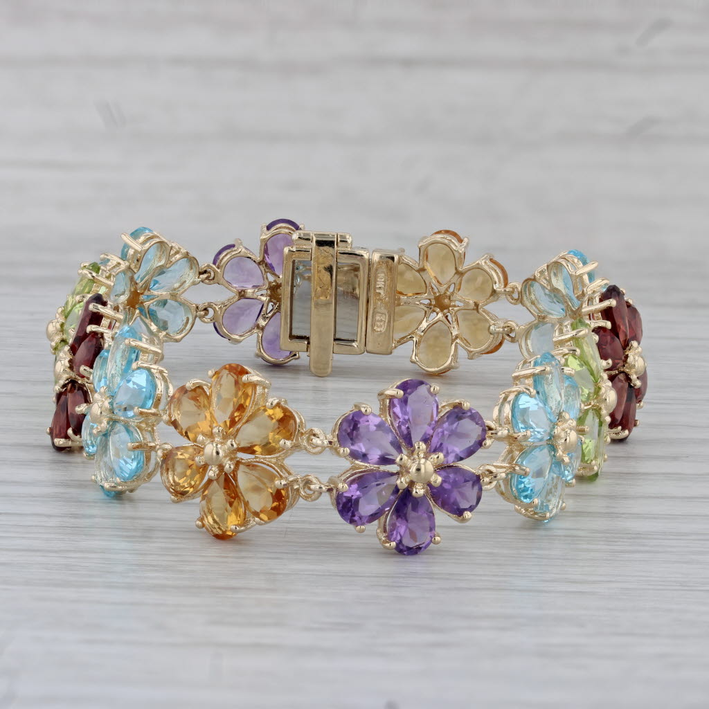 Gray 43.8ctw Gemstone Flower Bracelet 10k Gold 7" Garnet Topaz Peridot Amethyst