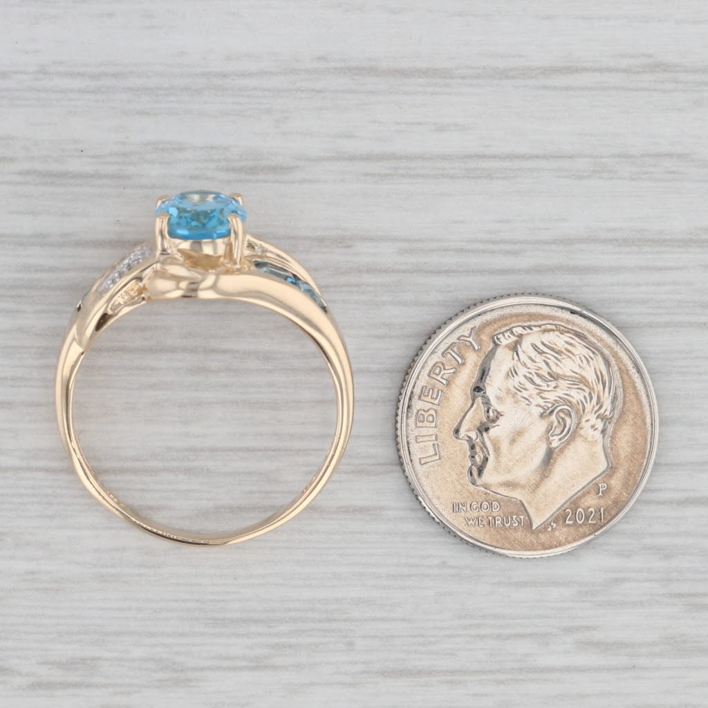 Gray 2.30ctw Oval Blue Topaz Bypass Ring 10k Yellow Gold Size 7.25 Diamond Accents