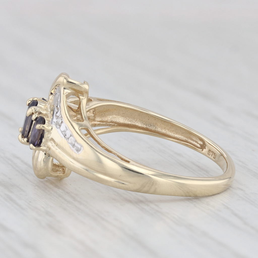 Light Gray 0.50ctw 3-Stone Iolite Bypass Ring 10k Yellow Gold Size 7.25