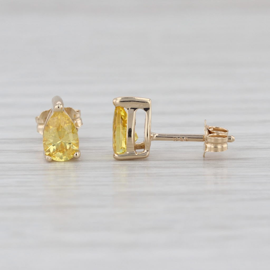 0.70ctw Yellow Cubic Zirconia Pear Stud Earrings 14k Yellow Gold Teardrop