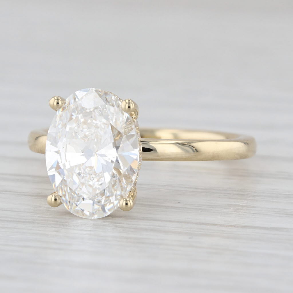 New IGI 3.09ctw Oval Halo Lab Grown Diamond Engagement Ring 14k Yellow Gold