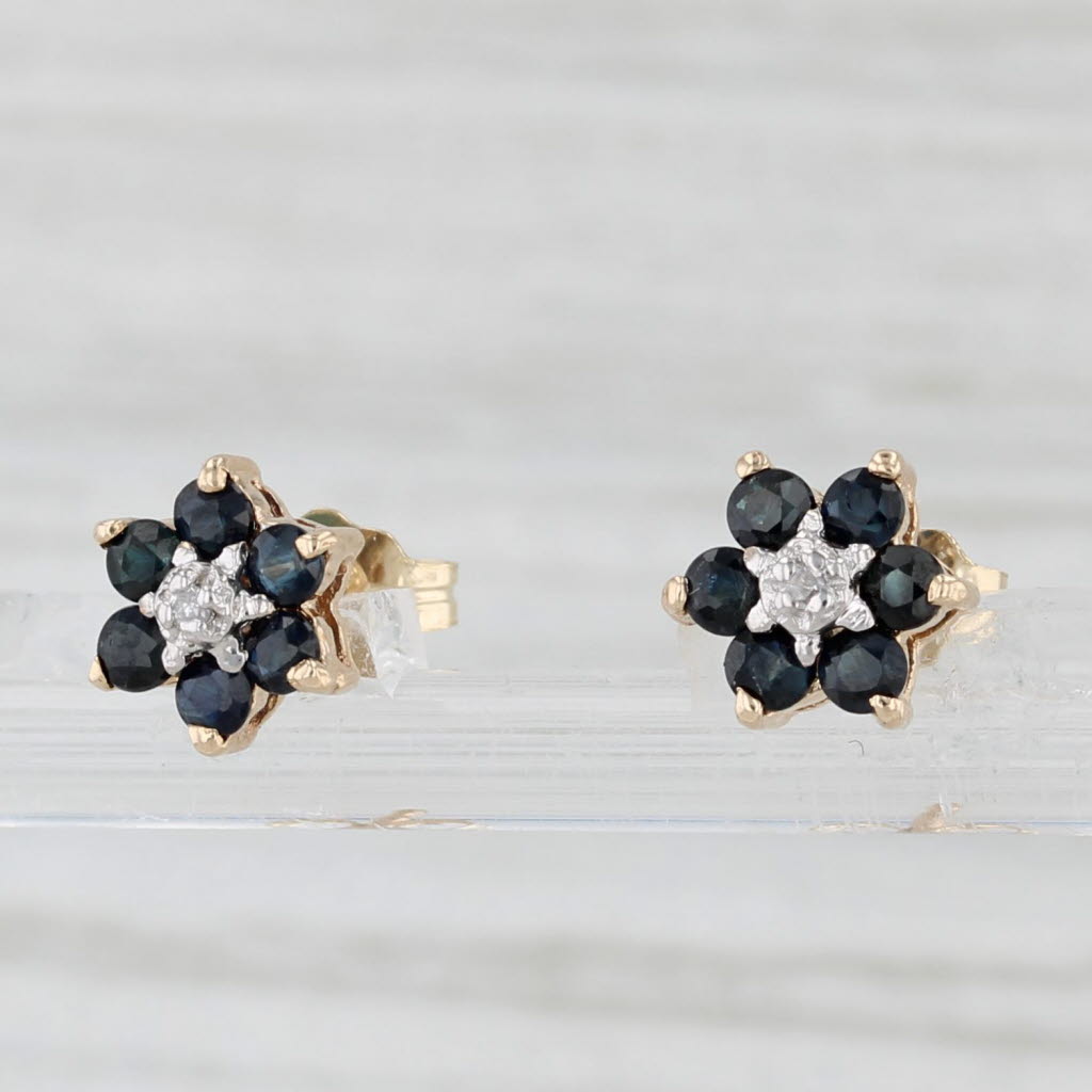 Light Gray 0.56ctw Blue Sapphire Flower Stud Earrings 10k Yellow Gold Diamond Accents