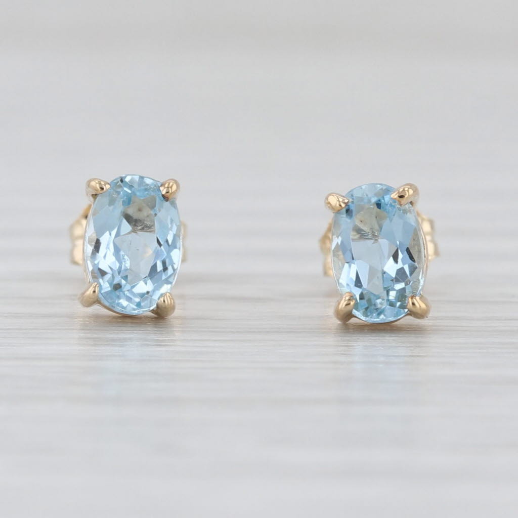0.80ctw Oval Aquamrine Solitaire Stud Earrings 14k Yellow Gold Studs