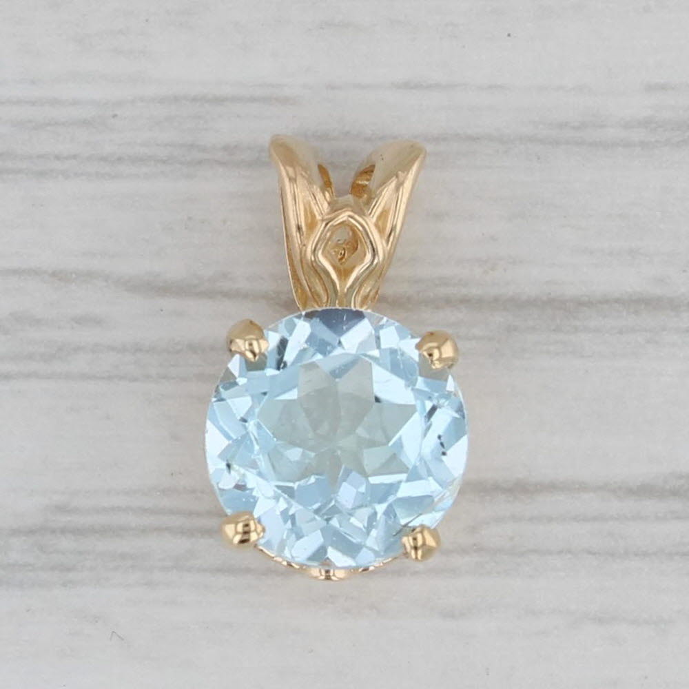Gray 2.30ctw Round Solitaire Blue Topaz Pendant 14k Yellow Gold