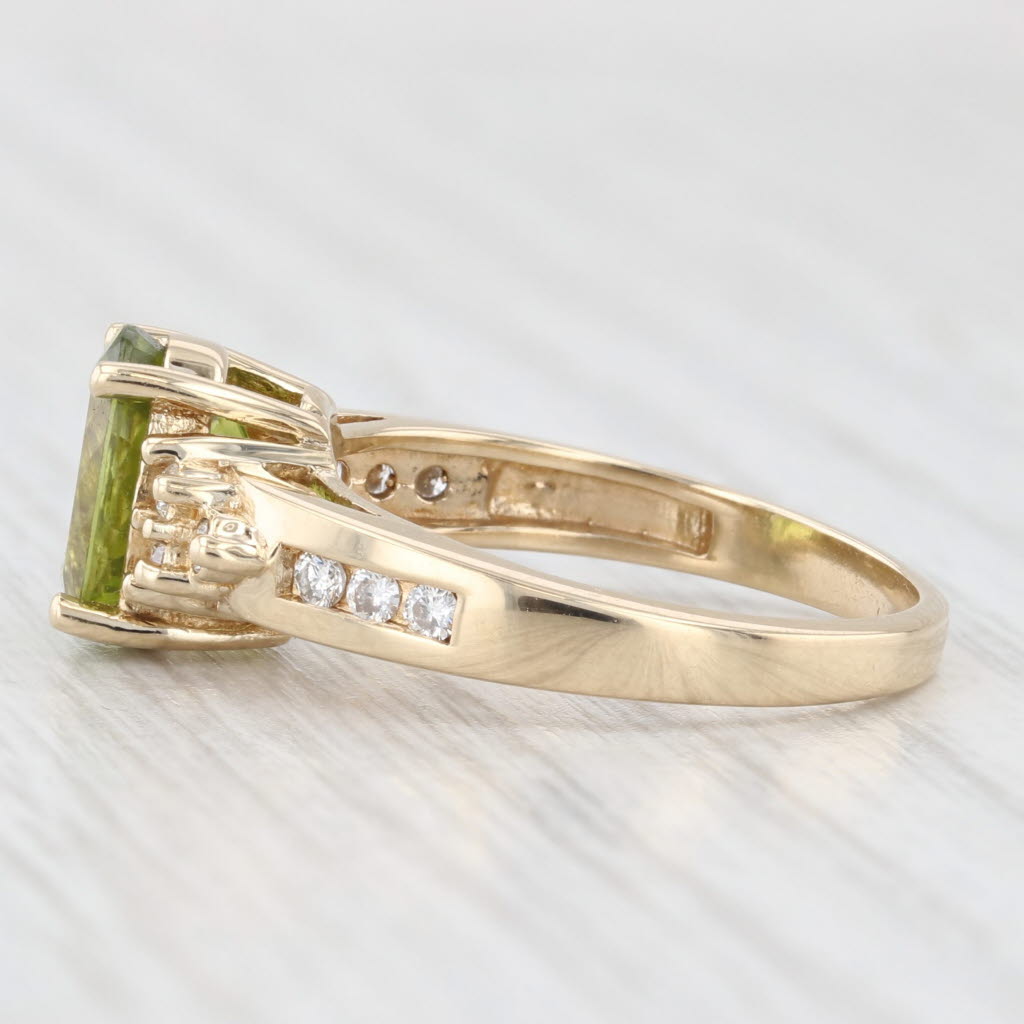 Light Gray 2.20ctw Oval Green Peridot Diamond Ring 14k Yellow Gold Size 7