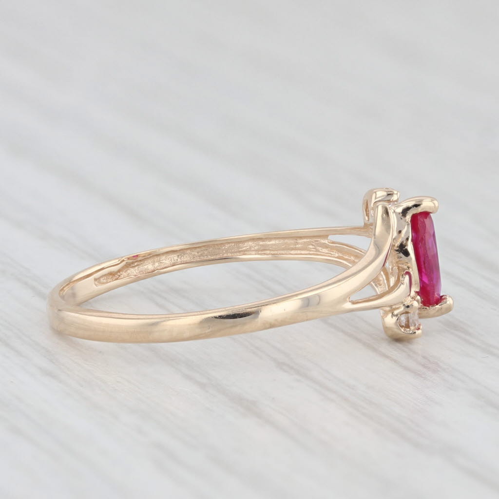 Light Gray 0.39ctw Lab Created Ruby Cubic Zirconia Ring 10k Yellow Gold Size 7 Bypass