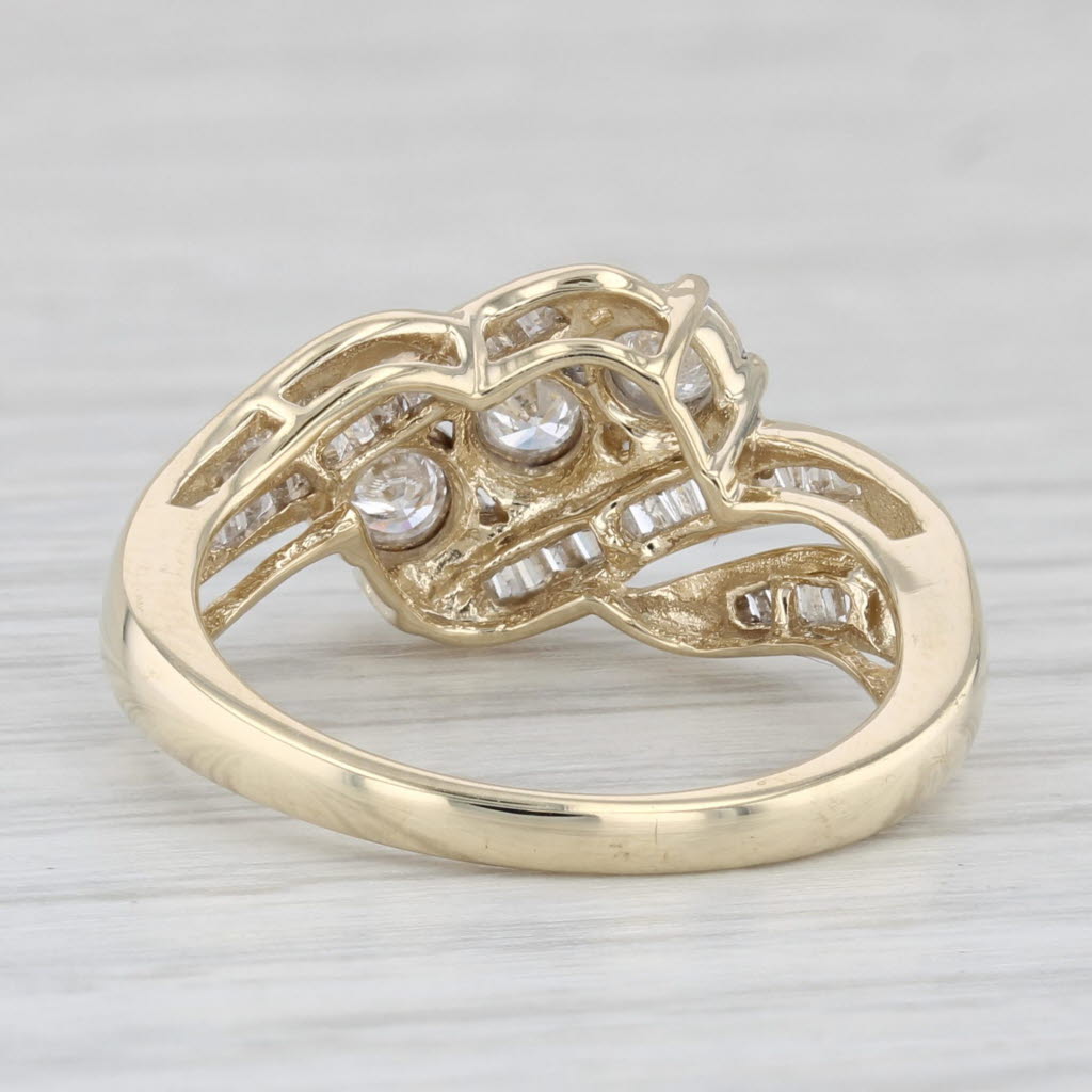 Light Gray 0.53ctw Round 3-Stone Diamond Bypass Ring 10k Yellow Gold Size 7